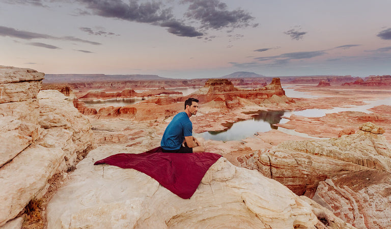 hiker taking a break on blanket